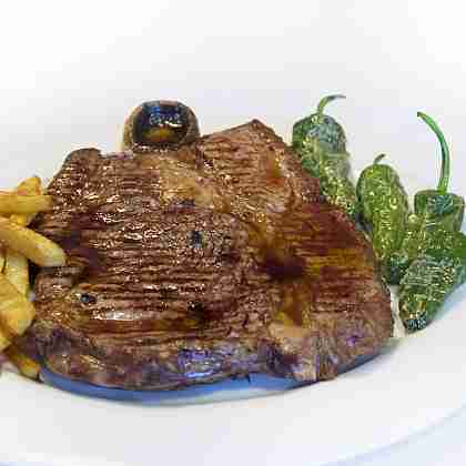 Grilled Sayago T-Bone steak accompanied with side dish