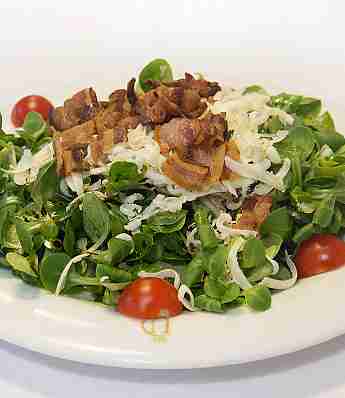 WARM CORN SALAD WITH IBERIAN “PAPADA” AND GOAT CHEESE